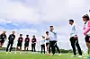 The Korean national women's football team and head coach Colin Bell, center, assemble during training at the Paju National Football Center in Paju, Gyeonggi, for a friendly against Jamaica on Monday. The friendly will be played on Saturday at Hwaseong Sports Town in Hwaseong, Gyeonggi. [YONHAP]