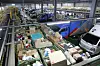 Parcels are piled up at a delivery hub in Gwangju, Gyeonggi, on Wednesday, after 102 of 140 CJ Logistics delivery workers working in nearby Seongnam, Gyeonggi went on strike to protest alleged abuse of power by a CJ Logistics courier agency manager. According to the delivery drivers' union, the manager verbally assaulted and fired an employee for joining the labor union. The union was to conduct a vote on a general strike Wednesday, but the vote was postponed to July 19 due to the Covid-19 pandemic. [NEWS1]