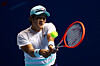 Kwon Soon-woo plays a backhand in his men's singles first round match against Thai-Son Kwiatkowski of the United States at the Singapore Tennis Open on Wednesday in Singapore. [GETTY IMAGES]