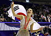 Kim Ye-lim celebrates on the podium after winning the gold medal in the women's singles at the ISU Grand Prix of Figure Skating NHK Trophy at the Makomanai Sekisui Heim Ice Arena in Sapporo, Japan on Saturday. [REUTERS/YONHAP]