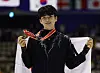 Cha Jun-hwan celebrates on the podium after winning the bronze medal in the men's singles at the ISU Grand Prix of Figure Skating NHK Trophy at the Makomanai Sekisui Heim Ice Arena in Sapporo, Japan on Saturday. [REUTERS/YONHAP]