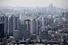 Korea had the fastest rising home prices in the third quarter, according to Knight Frank on Saturday. Seoul's apartment complexes and houses are in view in this photo taken on Sunday at Namsan, central Seoul. [YONHAP]