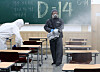A worker disinfects a hagwon (cram school) in Daejeon Thursday, two weeks before the annual College Scholastic Ability Test (CSAT). [NEWS1]