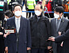 Prosecutor General Yoon Seok-youl's three lawyers stand before the reporters on Tuesday as they enter the Seoul Administrative Court to attend a hearing to seek an injunction to halt the administration's suspension of the top prosecutor. [YONHAP]