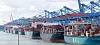 Cargo to be exported overseas being loaded on a dock in Busan on March 2. Growing expectations of a global recovery has helped improve Korea's current account balance. [YONHAP]