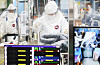Medical staff at Bagae Hospital, a Covid-19 designated hospital in Pyeongtaek, Gyeonggi, treat Covid-19 patients while in their protective gear on Thursday. [YONHAP]