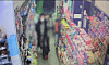 A four-year-old girl walks into a convenience store in Gangbuk District, northern Seoul, on Jan. 8, followed by a passerby who found her crying outside the store in her pajamas. She is wearing a borrowed coat. [CCTV FOOTAGE FROM THE STORE]
