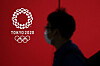 A pedestrian walks past a Tokyo 2020 Olympics logo in Japan Wednesday. Japanese Prime Minister Yoshihide Suga on Tuesday called North Korea's decision to skip the Tokyo Olympics a unilateral announcement. [AFP/YONHAP]