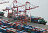 Trade containers stacked at Busan Port on Jan. 1