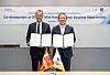 Torsten Lodberg Smed, left, senior partner at Denmark's Copenhagen Infrastructure Partners (CIP), and Jeong Tak, Posco International CEO, pose for a photo during a signing ceremony. Posco International on Tuesday said that it signed a memorandum of understanding with CIP, an investment firm focusing on renewables, to cooperate on an offshore wind farm project in Pohang, North Gyeongsang, and a joint hydrogen business. [POSCO INTERNATIONAL]