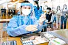 Medical professionals in Gwangju practice administering Covid-19 shots for patients at nursing homes in a mock drill Tuesday under the supervision of quarantine officials ahead of the government’s vaccination program set to kick off this Friday for residents and staff at high-risk facilities nationwide. [YONHAP]