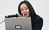 Min Hee-jin speaks to reporters on Feb. 25, with a laptop bearing an “ooak records” sticker. [NEWS1]