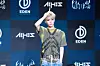 All(H)ours’ Minje poses for the camera during a press showcase Tuesday at the Ilchi Art Hall in Gangnam District, southern Seoul. [DANIELA GONZALEZ PEREZ]