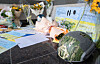 Bouquets, a donated military helmet, and letters of encouragement written by Koreans line the entrance to the Ukrainian Embassy in Yongsan District, central Seoul, on Sunday afternoon. [NEWS1]