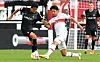 Freiburg's Korean midfielder Jeong Woo-yeong, left, and Stuttgart's Japanese defender Hiroki Ito vie for the ball during a Bundesliga match between VfB Stuttgart and SC Freiburg in Stuttgart, Germany, on Saturday. [AFP/YONHAP]
