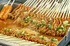 Red fish cakes at Naeto Traditional Market. [BAEK JONG-HYUN]