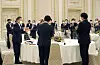 President Moon Jae-in, left, talks to the first-term lawmakers of the ruling Democratic Party at a Blue House meeting on Thursday. [YONHAP]