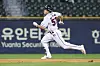 Doosan Bears outfielder Yang Chan-yeol runs the bases after hitting a two-run triple at the bottom of the seventh inning in a game against the KT Wiz at Jamsil Baseball Stadium in Seoul on Friday. [YONHAP]