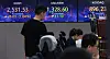 Screens in Hana Bank's trading room in central Seoul show stock and foreign exchange markets open on Thursday. [YONHAP]