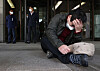 A former inmate of Brothers Home slumps on the floor outside the Supreme Court in Seoul on Thursday and cries upon the dismissal of an appeal filed against a not-guilty verdict for Park In-keun, the owner of Brothers Home, the state-run homeless facility. [YONHAP]