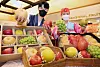 Models pose with assorted fruit in Chuseok holiday gift sets at Shinsegae Department Store's main branch in Jung District in central Seoul on Wednesday. [SHINSEGAE DEPARTMENT STORE]