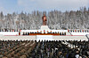 North Korean officials pay tribute Tuesday to late leader Kim Jong-il in front of his statue in Samjiyon, Ryanggang Province, in this photo released by state-run newspaper Rodong Sinmun on Wednesday. [YONHAP]