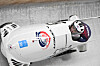 Won Yun-jong and Kim Jin-su compete in the two-man bobsleigh event at the Yanqing National Sliding Centre in Beijing on Tuesday. [AFP/YONHAP]