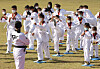 Children of Afghan 'special contributors' evacuated from Kabul in August learn taekwondo at the National Human Resources Development Institute in Jincheon County, North Chungcheong, on Wednesday. [JOINT PRESS CORPS]