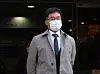 Kim Man-bae leaves the Seoul Central District Court in Seocho District, southern Seoul, following the conclusion of his arrest warrant review on Wednesday afternoon. [YONHAP]