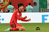 Son Heung-min reacts at the end of the match after beating Portugal 2-1 and qualifying for the knockout stages on Friday evening at the Education City Stadium in Al-Rayyan, west of Doha. [NEWS1]