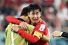 Son Heung-min celebrates with his teammates and coaching staff after beating Portugal 2-1 and qualifying for the knockout stages of the 2022 World Cup on Friday evening at the Education City Stadium in Al-Rayyan, west of Doha. [JOONGANG ILBO]