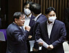 Kim Tae-nyeon, Democratic Party floor leader, clinching a fist after the ruling party pushed through major legislation that the party has been championing including higher taxation on real estates at the National Assembly on Tuesday in Yeouido, western Seoul. [YONHAP]