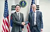 Korean Industry Minister Ahn Duk-geun, left, poses for a photo with U.S. Secretary of Energy Chris Wright during their meeting in Washington on March 20. Ahn and Wright agreed to cooperate to 'swiftly' resolve the issue of Seoul being designated a 'sensitive' country by the U.S. Department of Energy, according to the Ministry of Trade, Industry and Energy. [MINISTRY OF TRADE, INDUSTRY AND ENERGY]