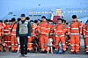 The first round of rescue personnel of the Korea Disaster Relief Team (KDRT) hold a moment of silence for the victims of the devastating earthquake that hit Turkey earlier this month after arriving at Seoul Air Base in Seongnam, Gyeonggi, on Saturday. [FOREIGN MINISTRY]