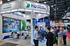 Attendees browse HD Hyundai Infracore's booth at the recent H2 MEET 2024 exhibition, which took place Sept. 25-27 at Kintex in Gyeonggi. [YONHAP]