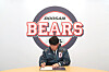 Yang Eui-ji poses while signing a new contract with the Doosan Bears in a photo released by the club on Tuesday.  [DOOSAN BEARS]