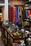 A shopper looks at camping equipment displayed at Play Monkey, a camping supply store in Yeongdeungpo District, western Seoul, on Wednesday. According to Lotte Mart, sales of camping gear between July 1 and 26 rose 36.8 percent on year as many chose to go camping instead of visiting crowded vacation spots during the pandemic. [YONHAP]