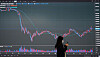 An electronic display shows the falling price of a cryptocurrency at an exchange in Seoul on July 19. [NEWS1]
