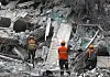 Rescue workers carry out a search operation at the site of a building that collapsed following an earthquake, in Bangkok, Thailand, on March 30. At least 17 people were confirmed dead, 32 injured and 83 were still missing in Bangkok, following a 7.7-magnitude earthquake that struck Myanmar and caused tremors in neighboring Thailand. [EPA/YONHAP]