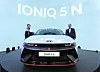 Hyundai Motor Group Executive Chair Euisun Chung, right, and Hyundai Motor CEO Chang Jae-hoon take a photo with the Ioniq 5 N at the Goodwood Festival of Speed held in West Sussex, Britain. First introduced in 2017 with the full support of Chairman Chung, the Hyundai N brand's accumulative sales broke 100,000 units as of the end of June. A total of 103,847 N models have been sold so far, with more than 90 percent from overseas. The N brand is Hyundai's high-performance line, targeting the same market as Mercedes-Benz’s AMG and BMW’s M ranges. [HYUNDAI MOTOR]