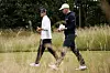 Rickie Fowler and Justin Thomas walk off the 4th tee during a practice round prior to the Genesis Scottish Open at The Renaissance Club in North Berwick, Scotland on Tuesday. [GETTY IMAGES]