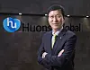 Huons Global Vice Chair and CEO Yoon Sung-tae poses in front of the company's logo after an interview with the Korea JoongAng Daily in Bundang, Gyeonggi, on March 3. [PARK SANG-MOON]