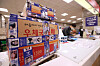 A delivery box is wrapped with Hope Tape at Gwanghwamun Post Office in central Seoul on Monday to mark International Missing Children’s Day. Hope Tape, available for customers to use as packaging tape at 22 general post offices in Seoul, is covered with descriptions of missing children. [YONHAP]