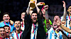 Lionel Messi lifts the World Cup trophy. [ONE FOOTBALL]