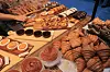 Bakery items are on display in the exhibition hall during the Cafe & Dessert Fair held at Coex Magok Lewest in Gangseo District, western Seoul, on May 8. The exhibition, which started on the same day, runs through May 11. [YONHAP]
