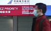 A traveller to China waits in a check-in line at the Incheon International Airport on Feb. 23. [NEWS1]