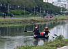 An emergency rescue team on Thursday searches for a woman in her 50s along the Oncheon stream in Busan. The woman has been missing ever since a heavy downpour hit the southern region of the peninsula on Wednesday. [BUSAN METROPOLITAN CITY FIRE DISASTER HEADQUARTERS]