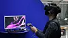 A user virtually experiences artist Huang Hsin-Chien's 'Bodyless,' complete with a headset and remote control. [BIFAN]