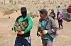 Locals in Mongolia are handed out seedlings in a project with Korea in 2017. [KOREA FOREST SERVICE]