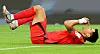 Kim Min-jae reacts after slipping while trying to chase down Darwin Nunez of Uruguay during a World Cup Group H match against Uruguay at Education City Stadium in Qatar on Thursday. [YONHAP]